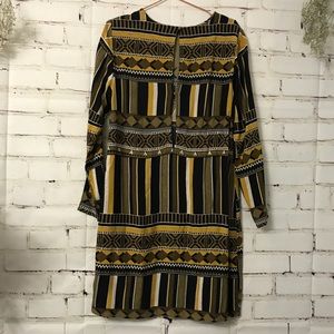 Beautifully patterned dress.